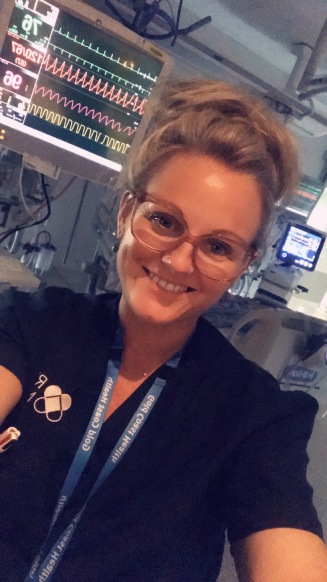 Debbie-Jane in nursing scrubs